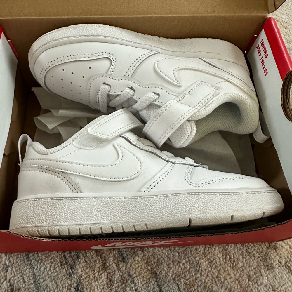 NWT White Brand new in box Nike toddler sneakers size 9. Price is firm.